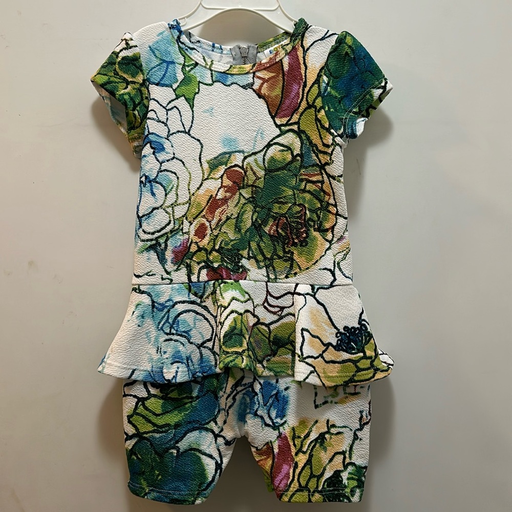 Dot Dot Smile romper size 3/4. Like new! Never got to wear this one!